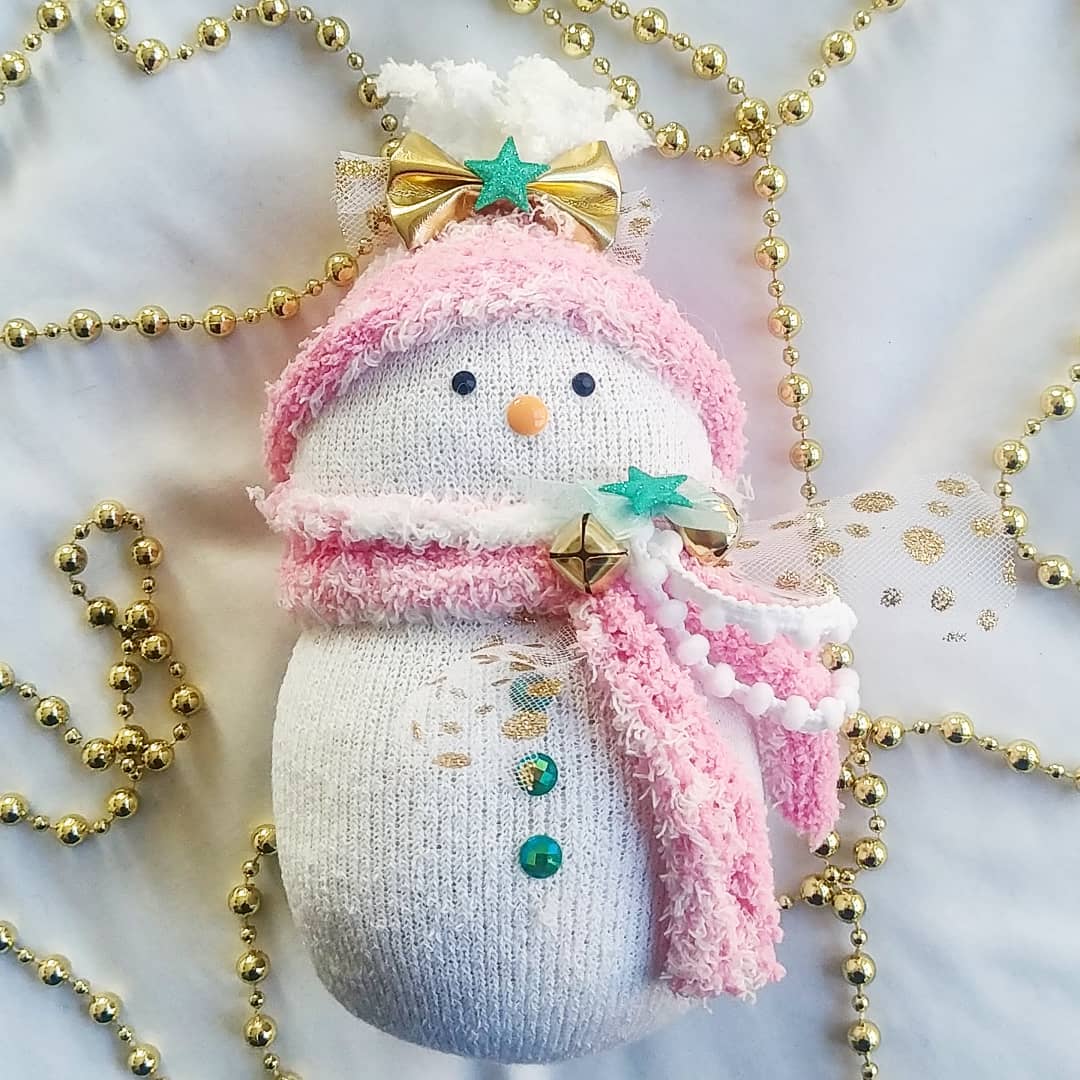 Small Homemade Snowman Doll Made out of a Sock. Photo by Instagram user @supreme_glitter_queen