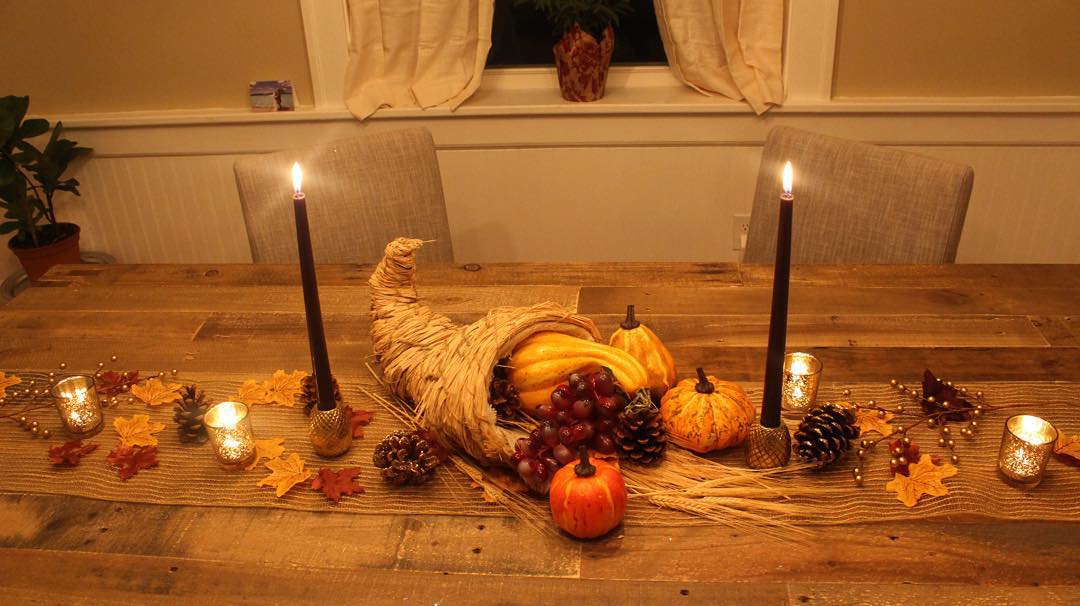 Homemade Cornucopia Sitting on Rustic Dinner Table. Photo by Instagram user @joannevictorio