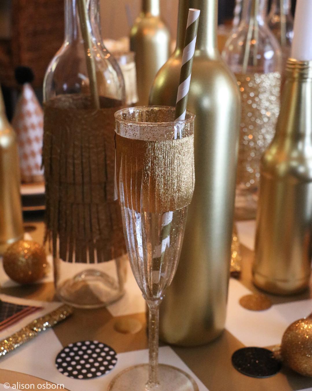 New Year's Eve Champagne Glass with Golden Accents. Photo by Instagram user @alisoninspires