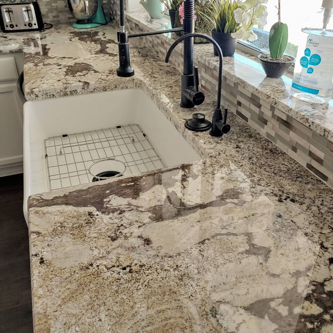 Clean Granite Countertops and Kitchen Sink. Photo by Instagram user @creativestonedesignsllc