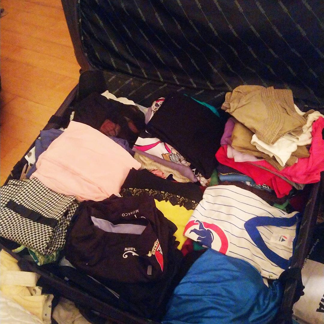 Suitcase Full of Summer Clothes to be Donated. Photo by Instagram user @shafin917