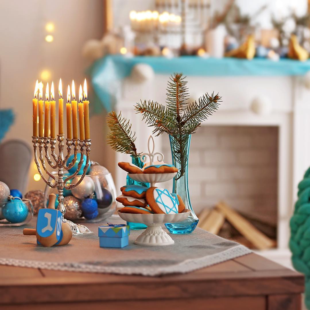 Table Decorated with Menorah and Christmas Cookies. Photo by Instagram user @lanterradev