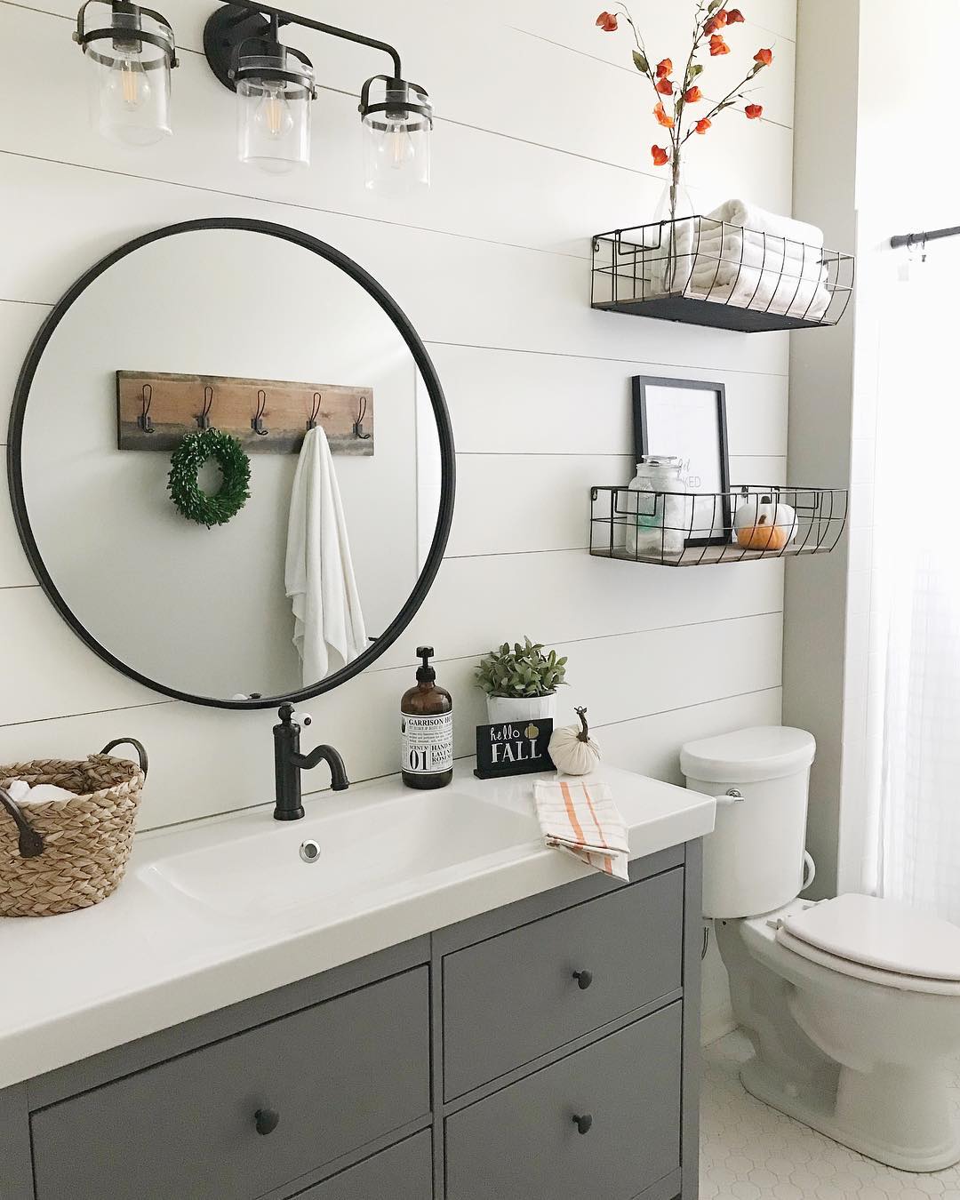 Home Bathroom with Fall Decorations and Wreaths. Photo by Instagram user @randrathome