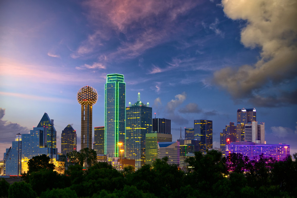 Dallas, Texas city skyline at sunset.