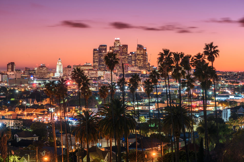 Los Angeles, California city skyline at sunset.