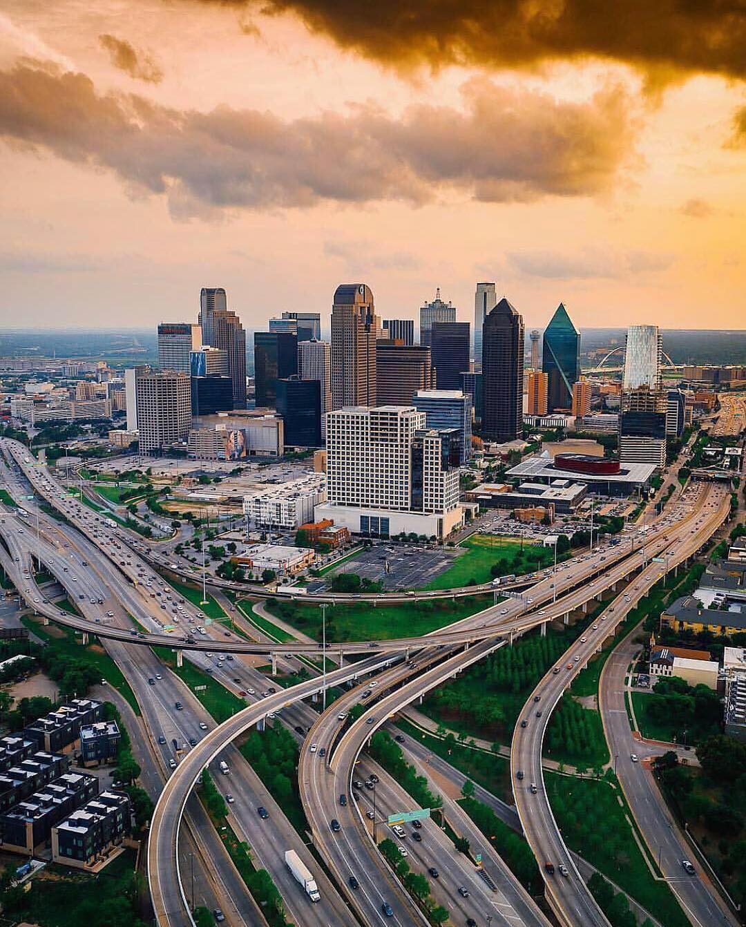 Aerial view of Dallas downtown and freeways at dusk Photo by Instagram user @dallascitypage
