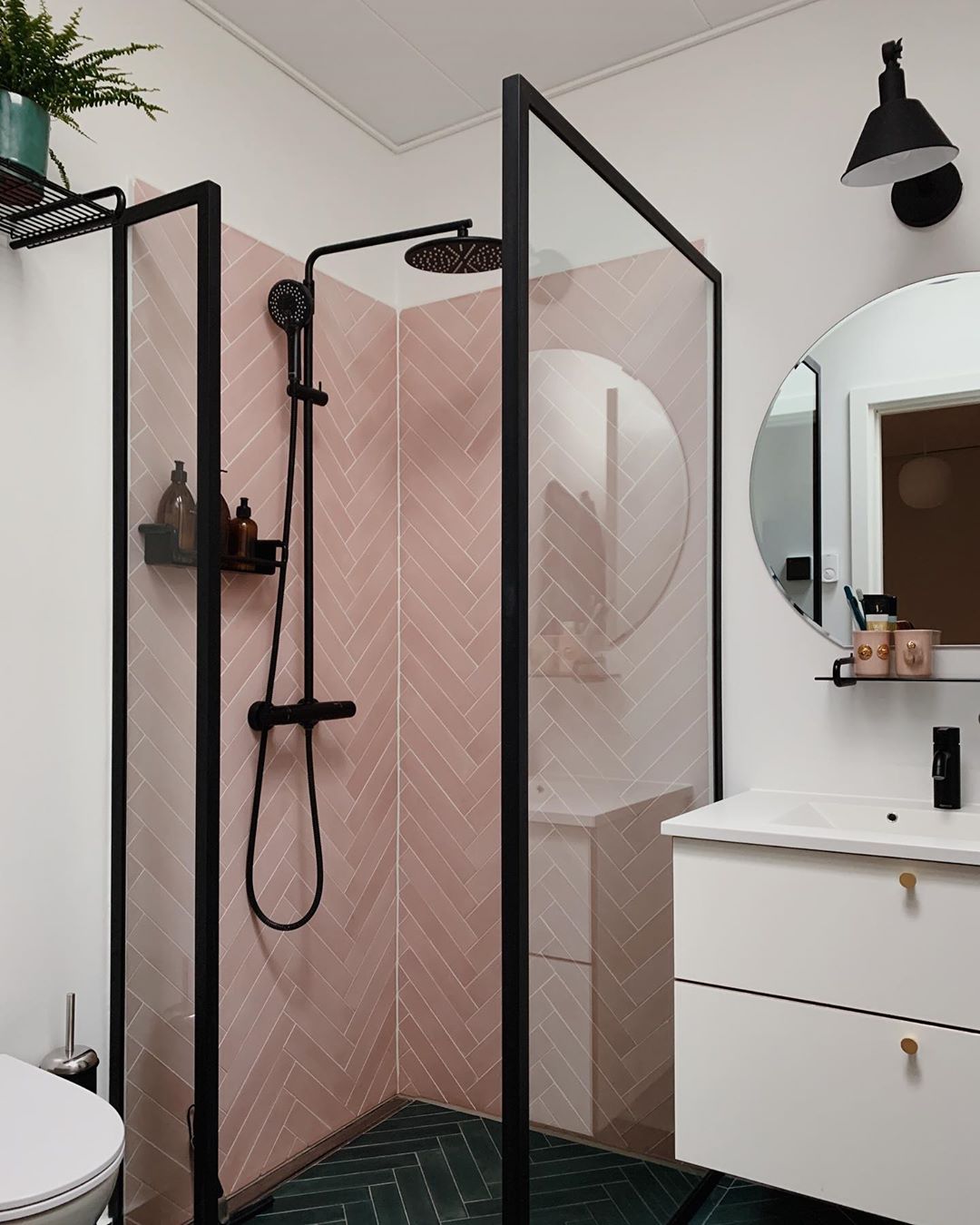 Modern bathroom with pink tile in shower. Photo by Instagram user @ditteblog