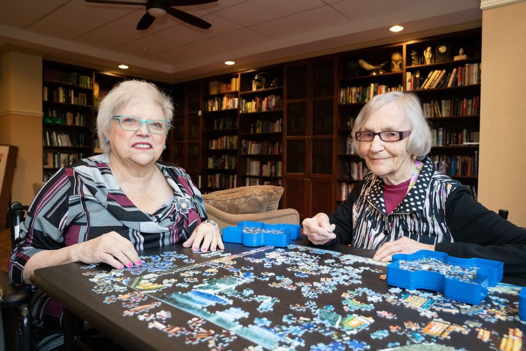 Senior Women Doing a Puzzle in a Senior Care Home. Photo by Instagram user @allseniorscarelivingcentres