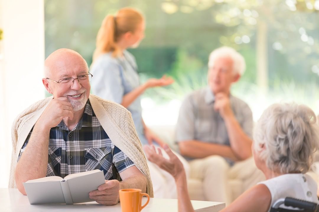 Seniors Discussing a Book. Photo by Instagram user @thevillasatstanfordranch