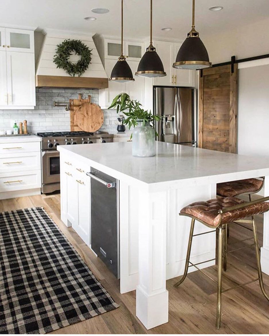 Modern farmhouse kitchen with stainless steel appliances. Photo by Instagram user @apogee_house