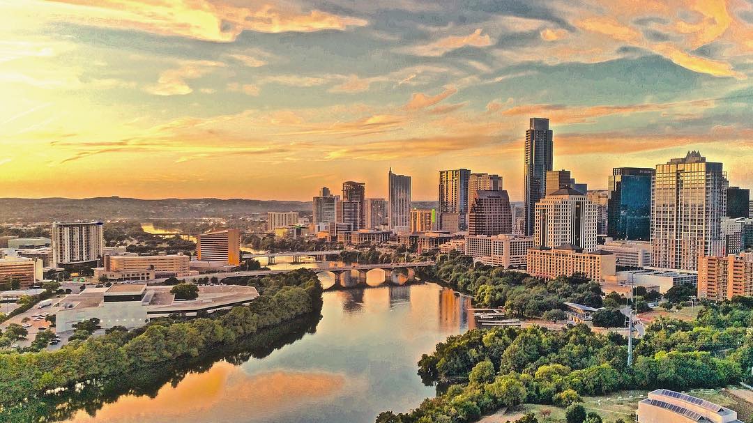 Austin, Texas skyline at sunset. Photo by Instagram user @austinluxuryrentals