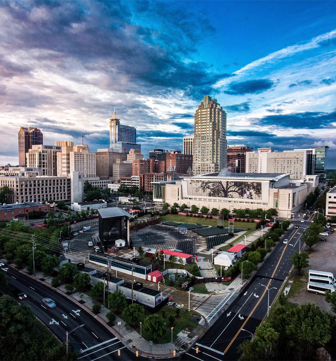 Downtown Skyline of Raleigh NC photo at dusk photo by Instagram user @visitraleigh