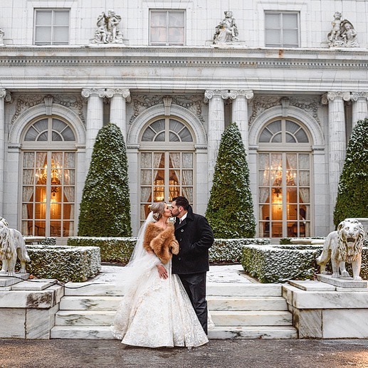 Bride and Groom Kissing at Their Wedding at Newport Mansion in Rhode Island. Photo by Instagram user @newport_mansionsweddings