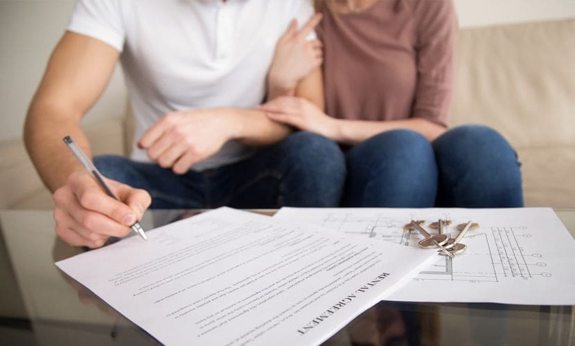 Couple Signing Lease Agreement. Photo by Instagram user @citycountryhomes