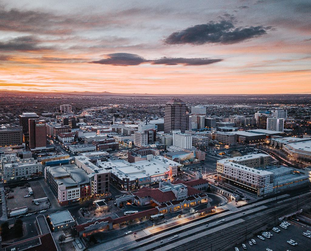 Overhead view of downtown Albuquerque at dusk. Photo by Instagram user @zcokes