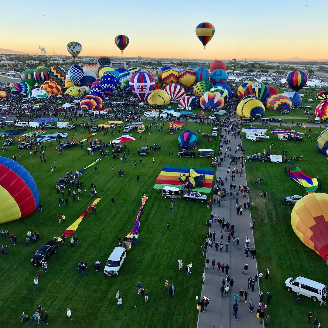 Overhead view of hot air balloons being unloaded at the Albuquerque International Balloon Fiesta. Photo by Instagram user @outofoffice247
