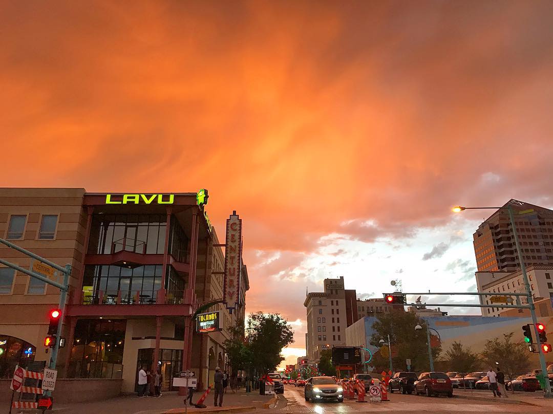 Street view of downtown Albuquerque street at dusk. Photo by Instagram user @downtownalbuquerque