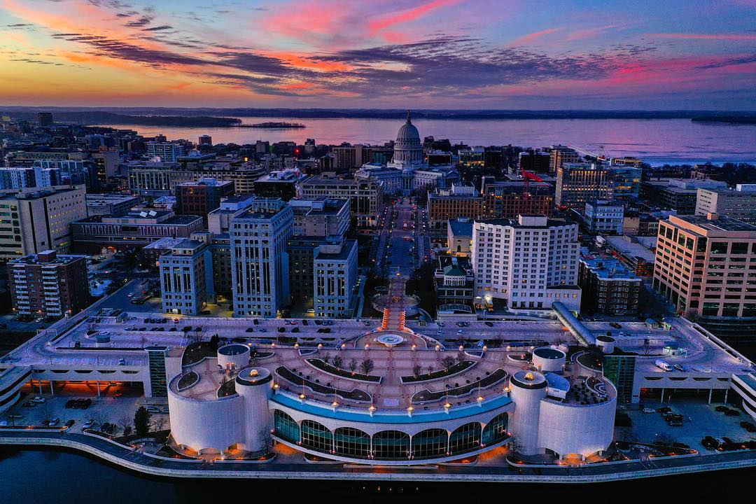 Overhead view of downtown Madison during colorful sunset. Photo by Instagram user @ovjphotography