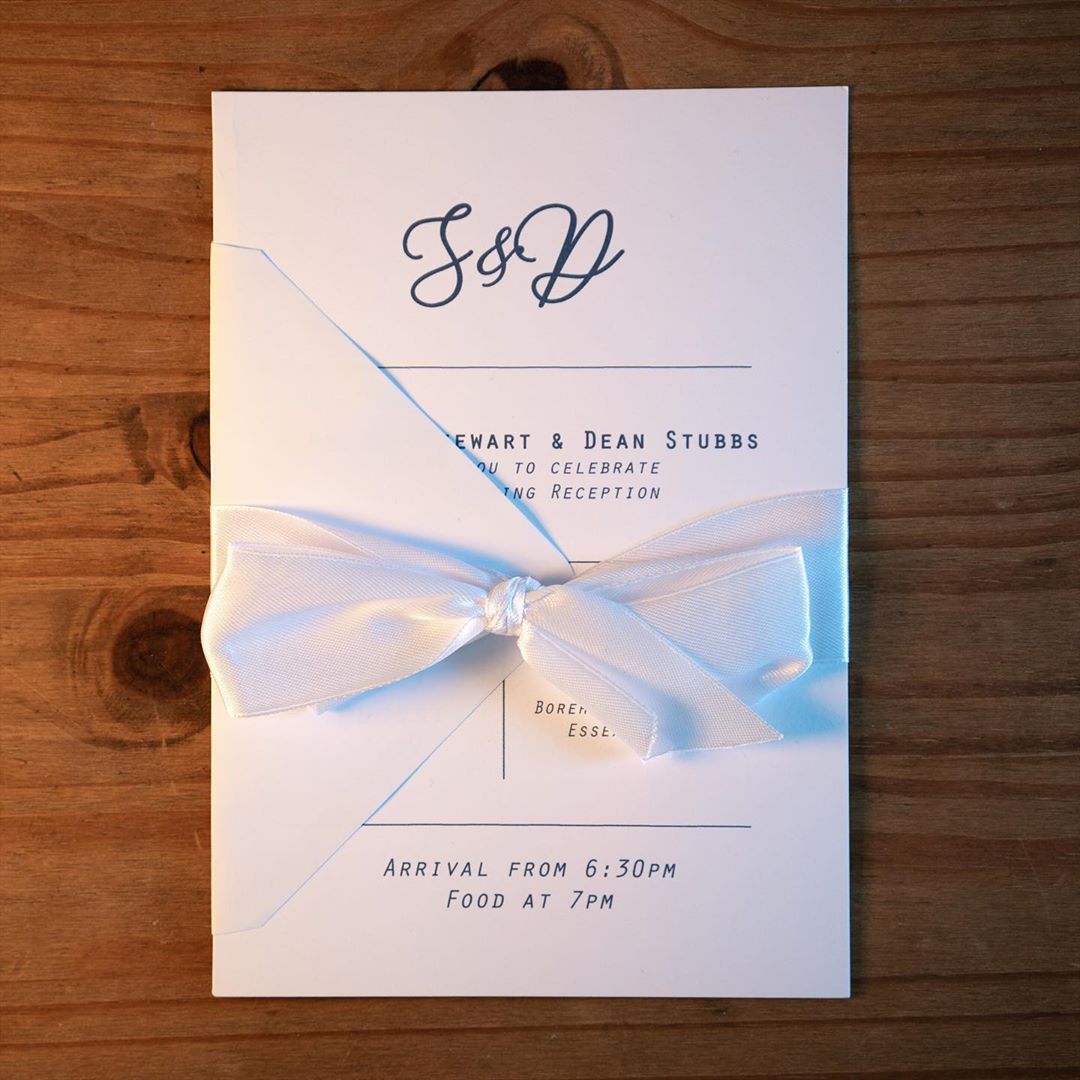 Wedding Invitation Tied with a Bow. Photo by Instagram user @katiefrancesart