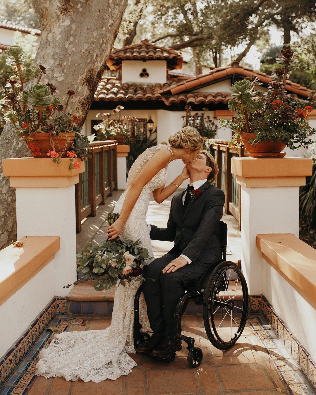 Bride and Groom Kissing in a Beautiful Location. Photo by Instagram user @jordanvoth