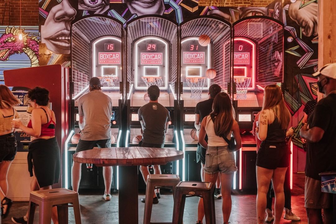 People playing games at Boxcar Bar + Arcade in Raleigh. Photo by Instagram user @boxcarral.