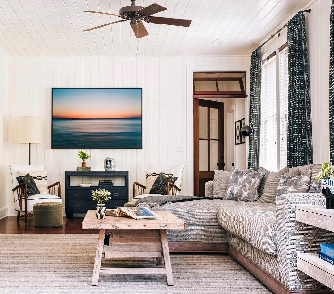 Living room with modern ceiling fan. Photo by Instagram user @cortneybishopdesign