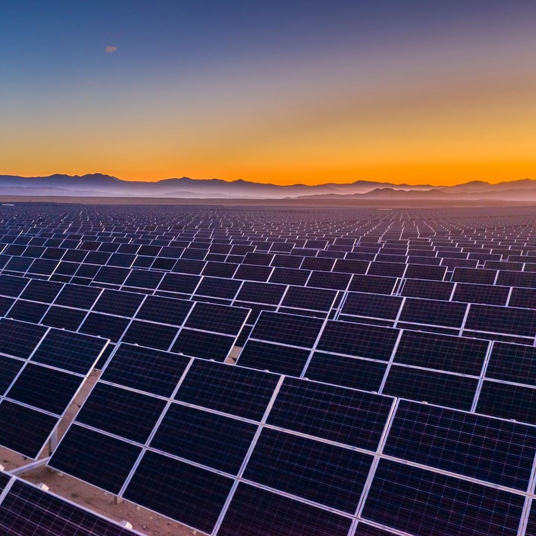 Solar panels at sunset. Photo by Instagram user @environmental_defense_fund