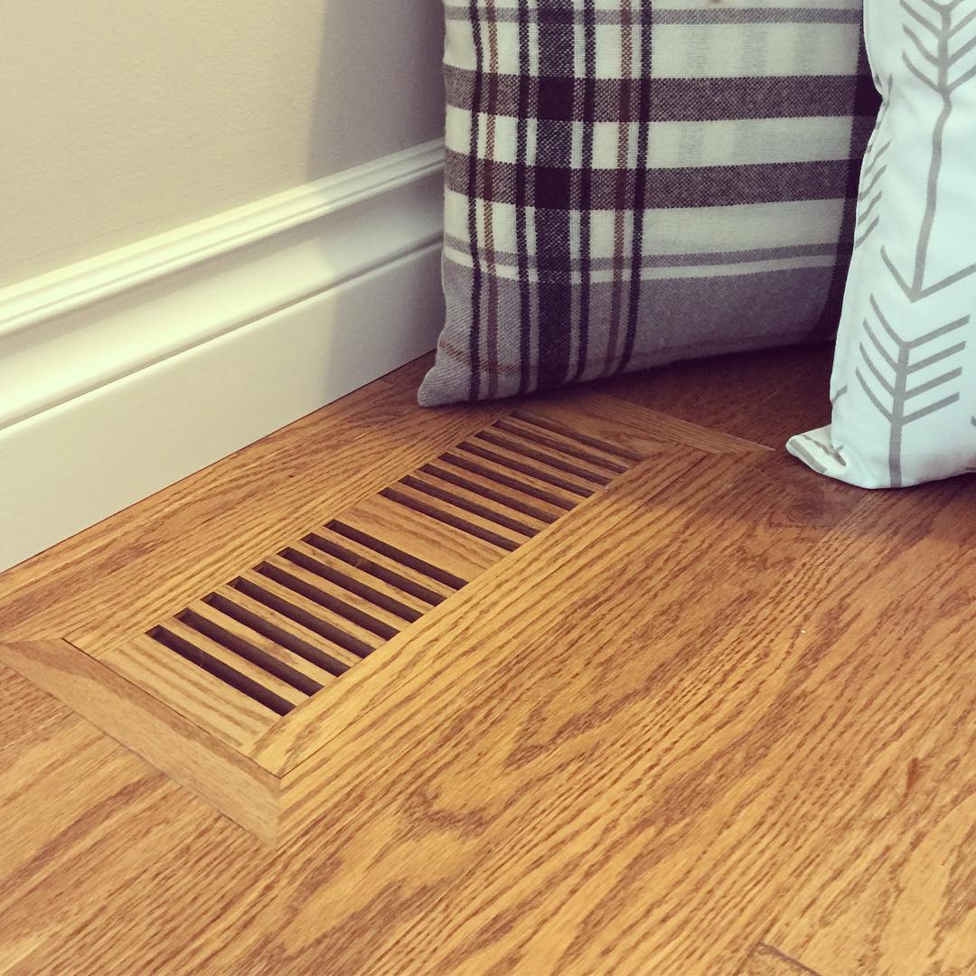Vents in wood floor. Photo by Instagram user @airwood_flooring_accessories