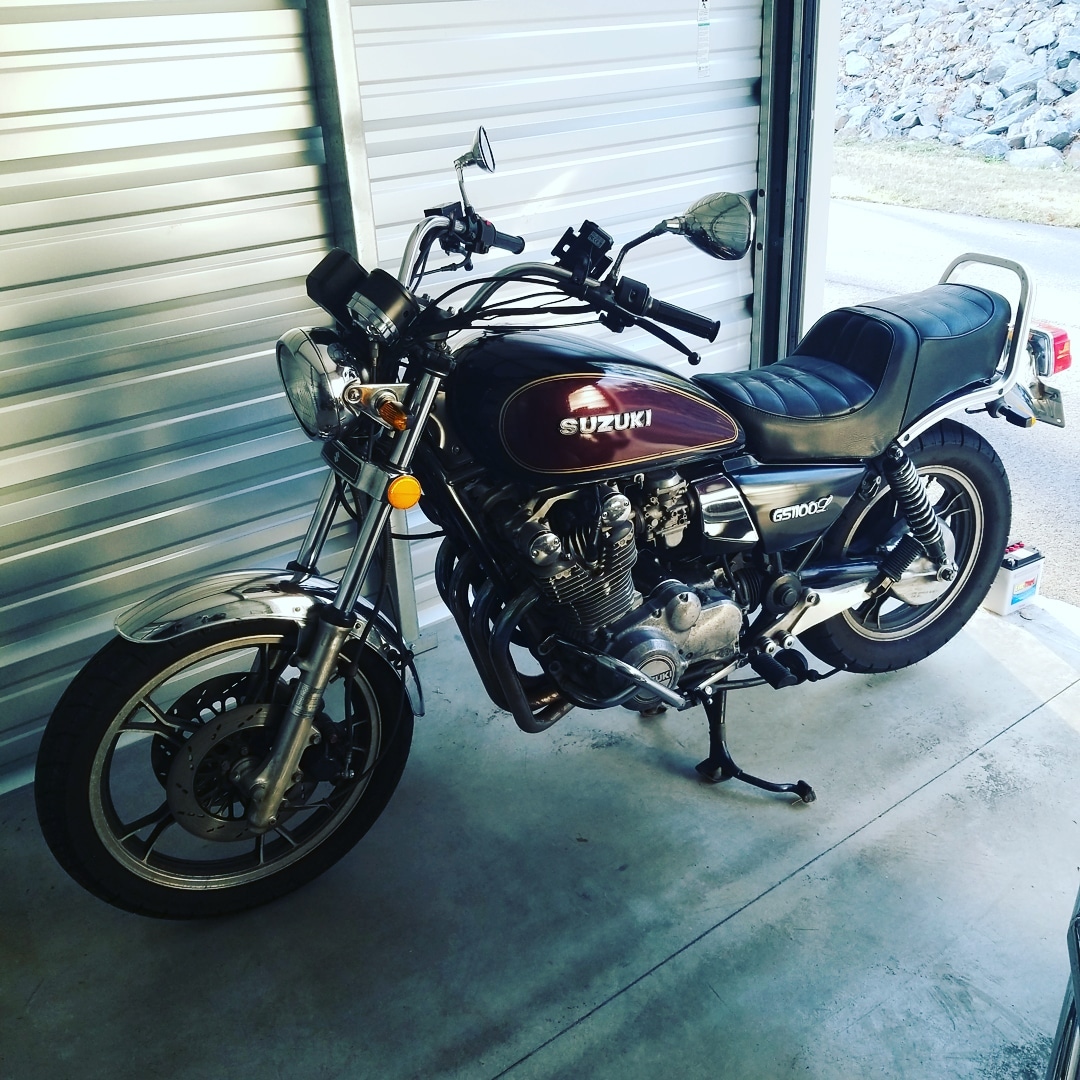 suzuki motorcycle being stored inside of a self storage unit photo by Instagram user @newenglandroast