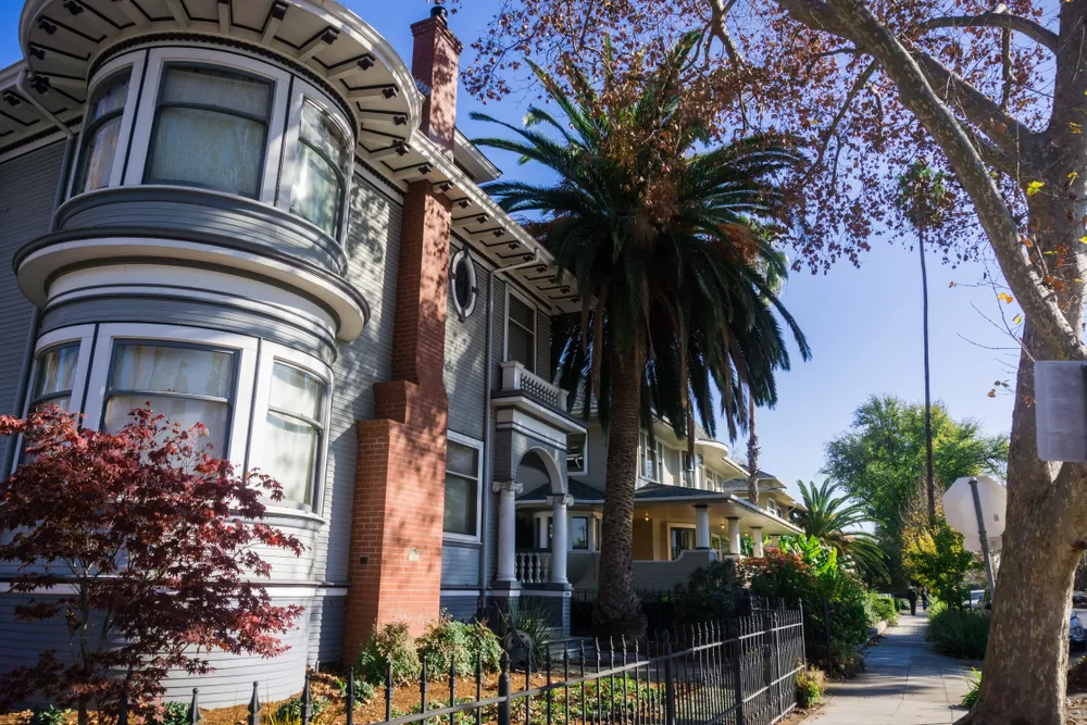 San Jose Brownstone with Palm Trees in front