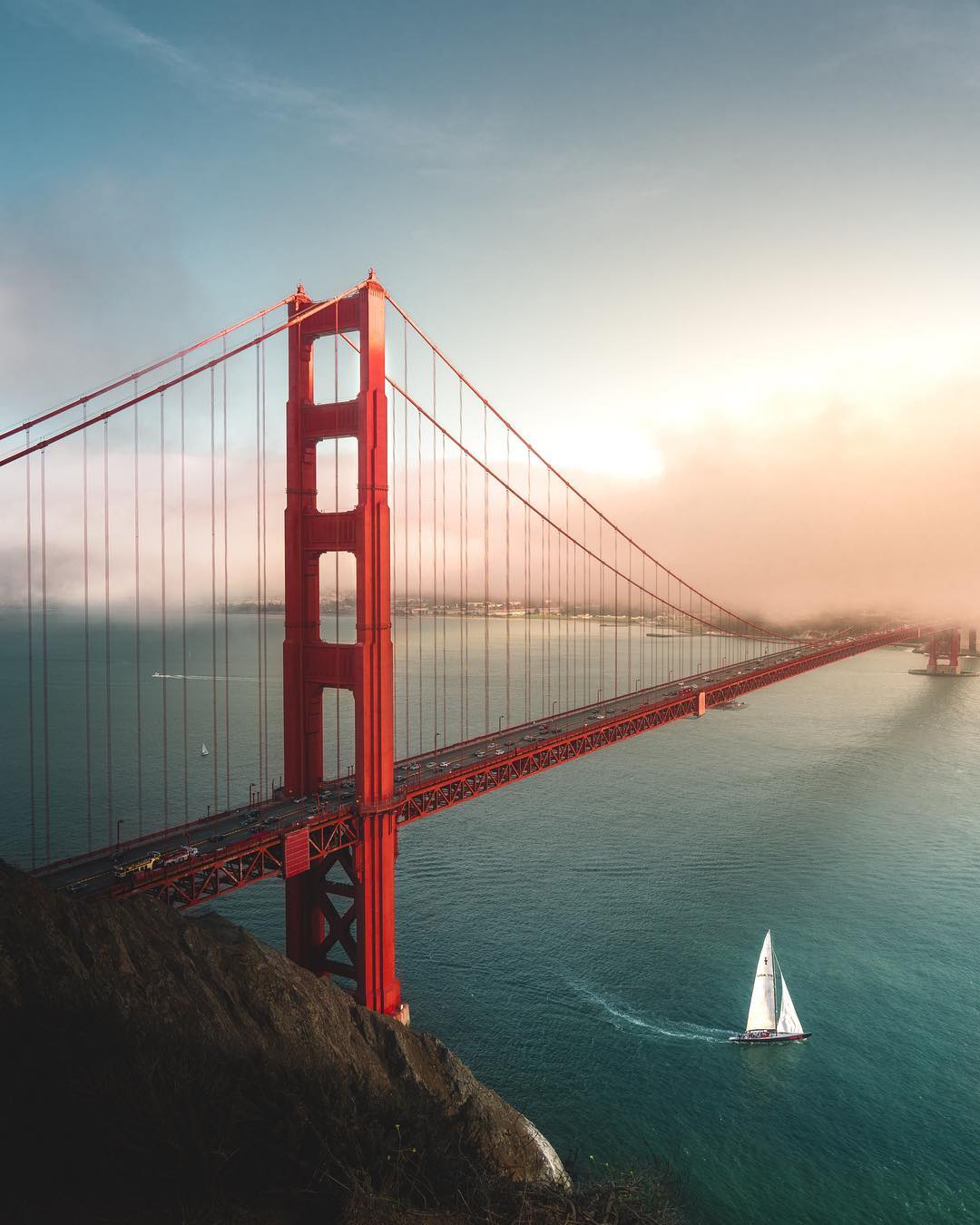 Aerial view of the red Golden Gate Bridge. Photo by Instagram user @paige_tingey