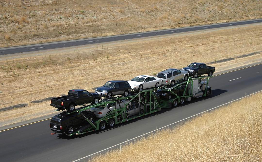 Truck of cars being transported. Photo by Instagram user @directconnectauto