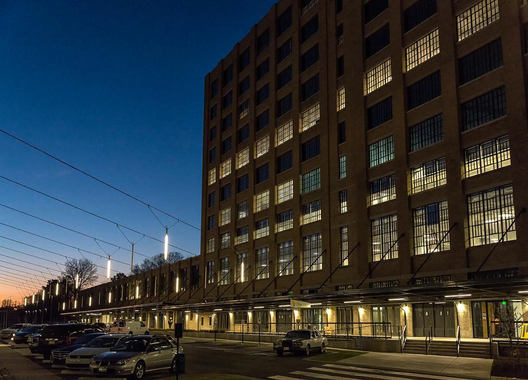 Crosstown Concourse building at night in Crosstown, Memphis. Photo by Instagram user @mikekerrmemphisphoto
