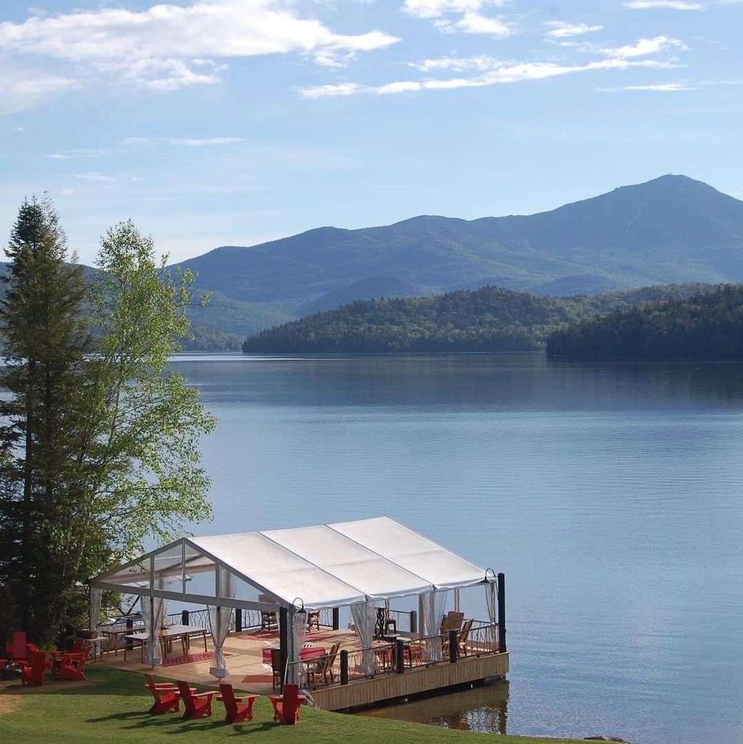View of Lake Placid on a sunny day. Photo by Instagram user @lakeplacidlodge