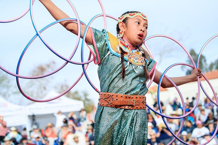 Youth hoop dancer in traditional dress. Photo by Instagram user @heardmuseum