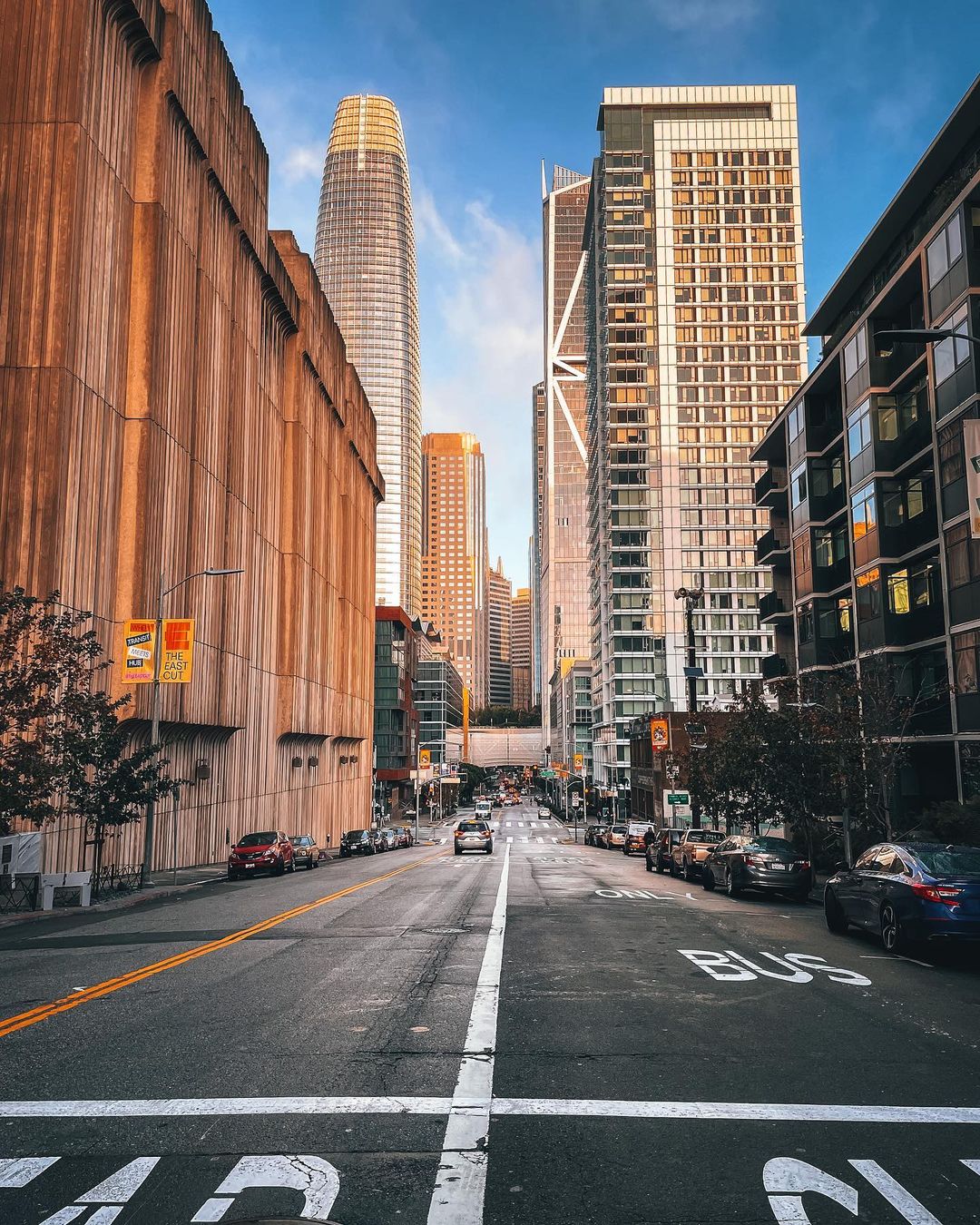 A city street in Downtown San Francisco with a view of high rise buildings. Photo by Instagram user @jennytranphoto