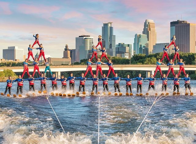 Three human pyramids performing a water skiing show on the Mississippi River in Minneapolis. Photo by Instagram user @sammifolkenson.