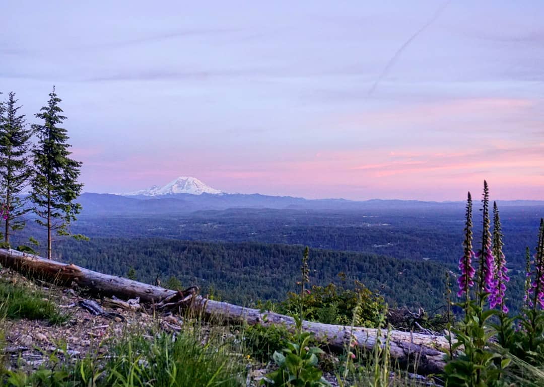 Tiger Mountain overlooking Seattle with Mount Rainier in the distance. Photo by Instagram user @vagabondfreelancer
