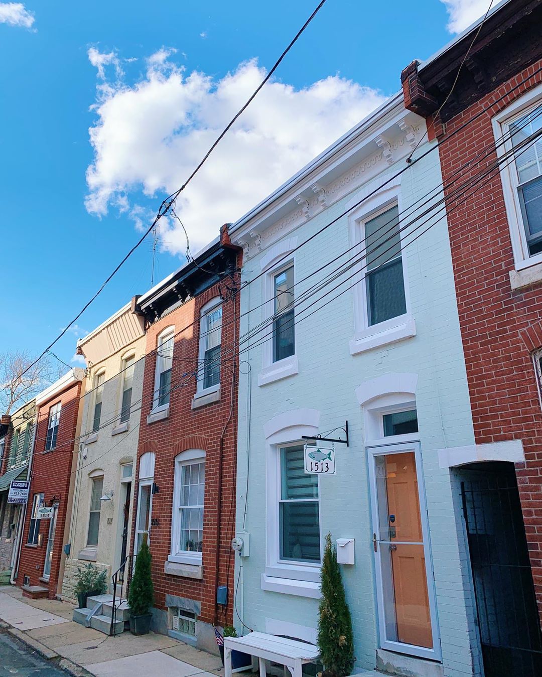 White and brick rowhouses in Fishtown,Philadelphia. Photo by Instagram user @phlspecial