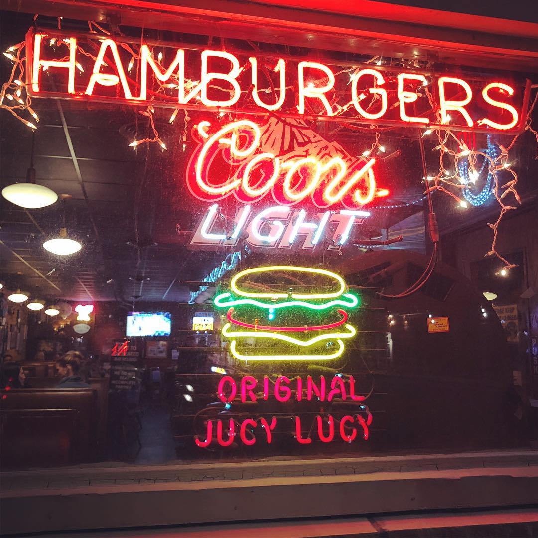 Neon with a hamburger on it. Photo by Instagram user @snowslux