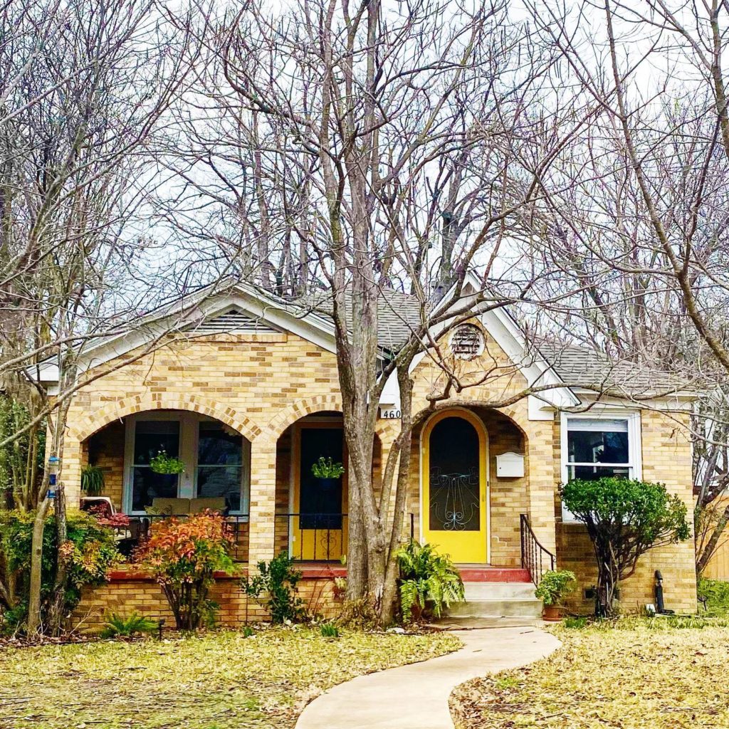 Cozy brick house in the Hyde Park neighborhood of Austin, TX. Photo by Instagram user @charmingaustintexas