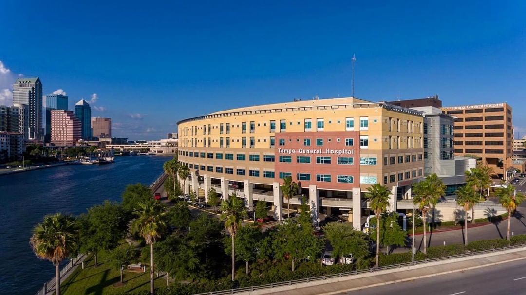 A wide shot of Tampa General Hospital on the Tampa Riverwalk. Photo by Instagram user @tampariverwalk