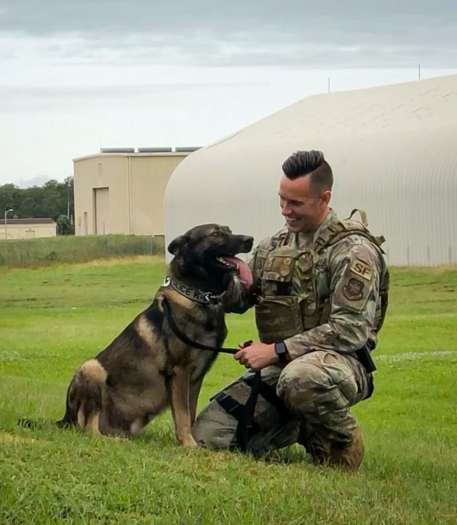 A member of the armed forces with his dog at MacDill Air Force Base. Photo by Instagram user @mc360co