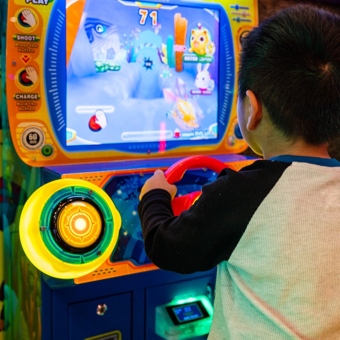 A child playing a game at Jungle Fun Island. Photo by Instagram user @junglefunisland