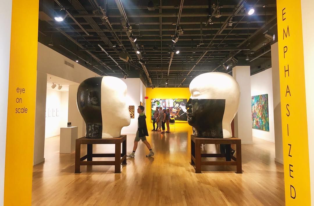 Giant black and white head exhibit at the Hawaii State Art Museum. Photo by Instagram user @micnmylove