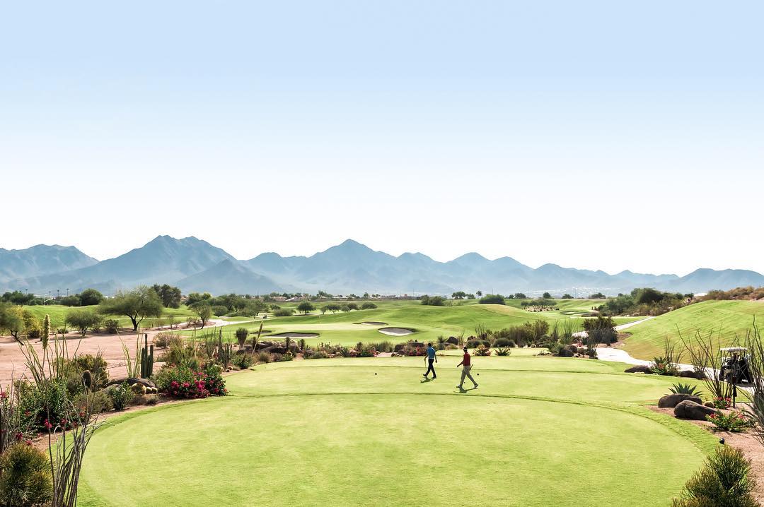 Golf course with mountains in the horizon in Scottsdale, AZ. Photo by Instagram user @scottsdaleariz