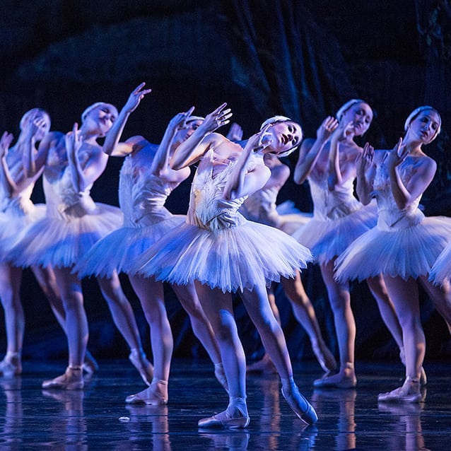 Ballet dancers posing on stage. Photo by Instagram user @kc.ballet