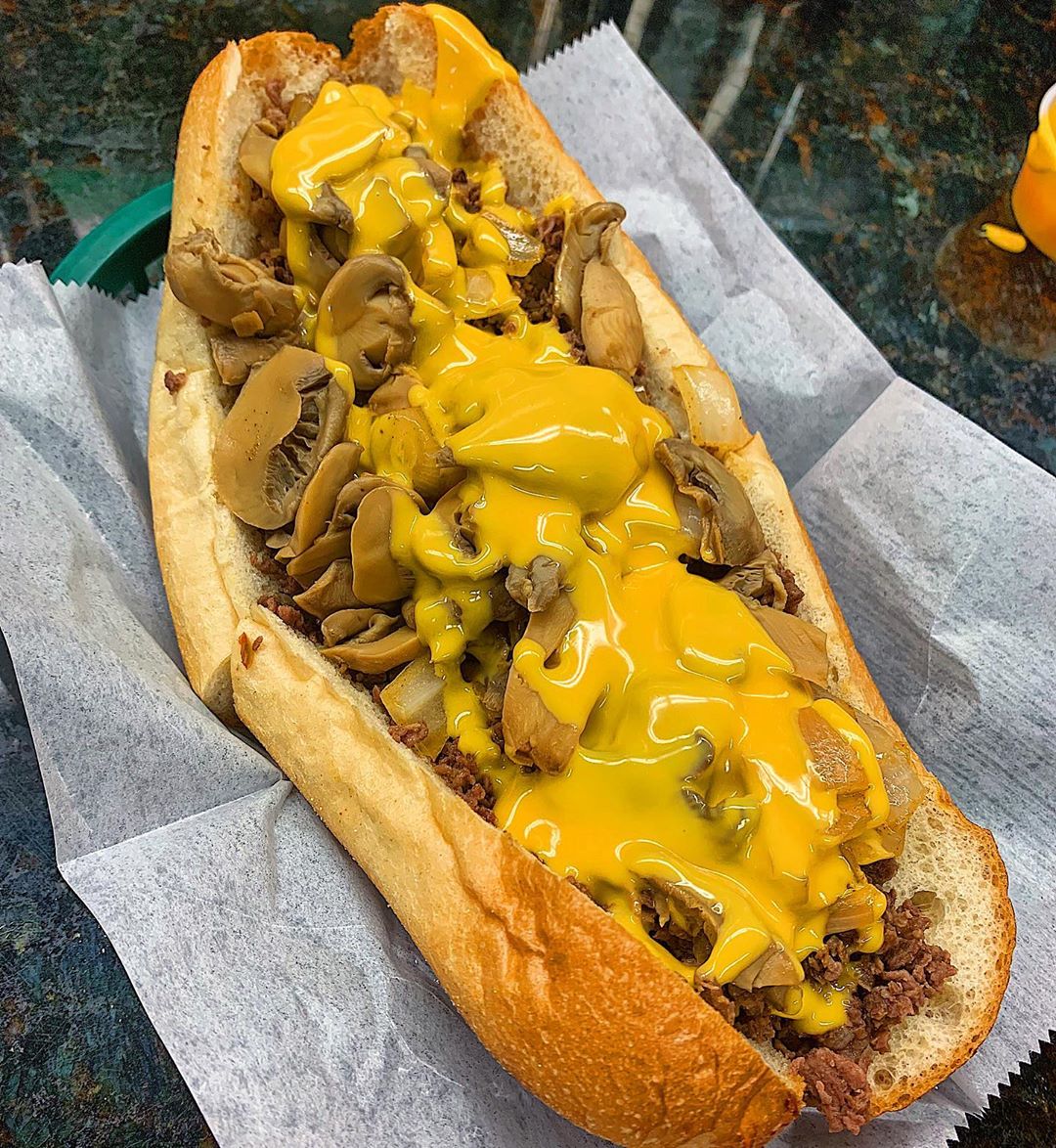 Philly cheesesteak covered in mushrooms and nacho cheese. Photo by Instagram user @manswhoate