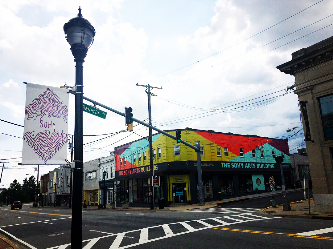 Colorful painted building on a sunny day in Hyattsville, MD. Photo by Instagram user @hvillelife