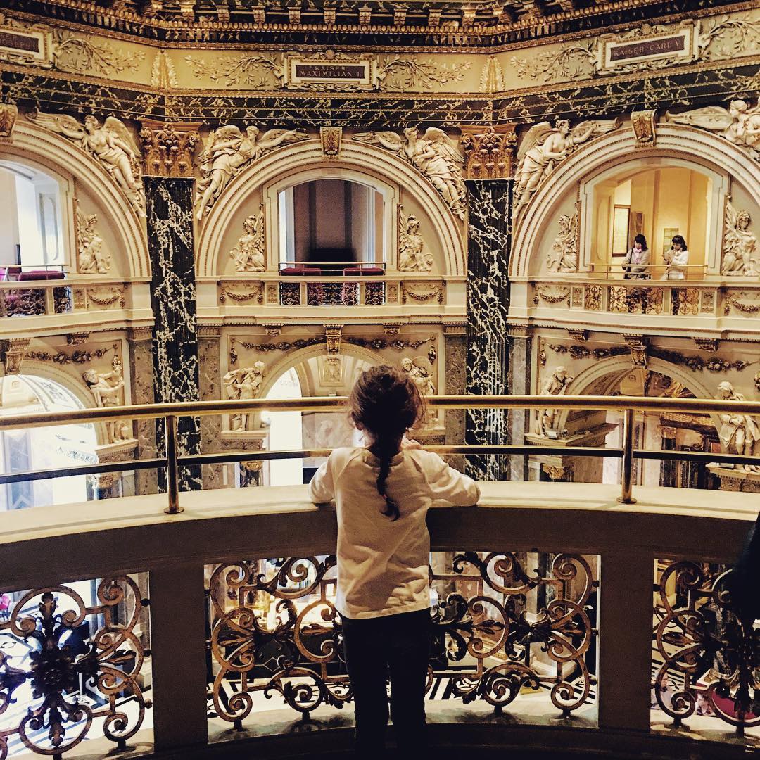 Little girl standing inside Vienna museum. Photo by Instagram user @theexpatchronicle